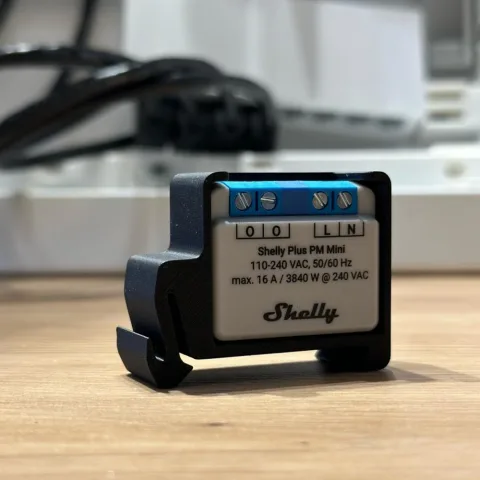 Suport de Sina DIN pentru Shelly MINI, din material ignifug, negru MINIDIN